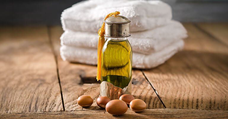 Argan olie fles met achtergrond