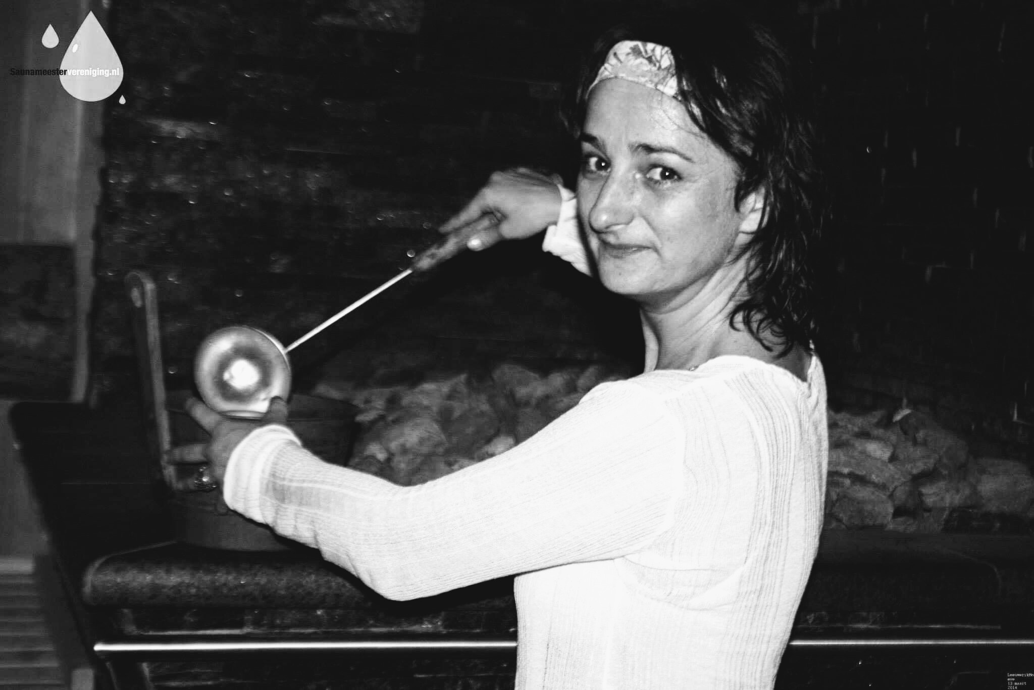 Pour water in the sauna